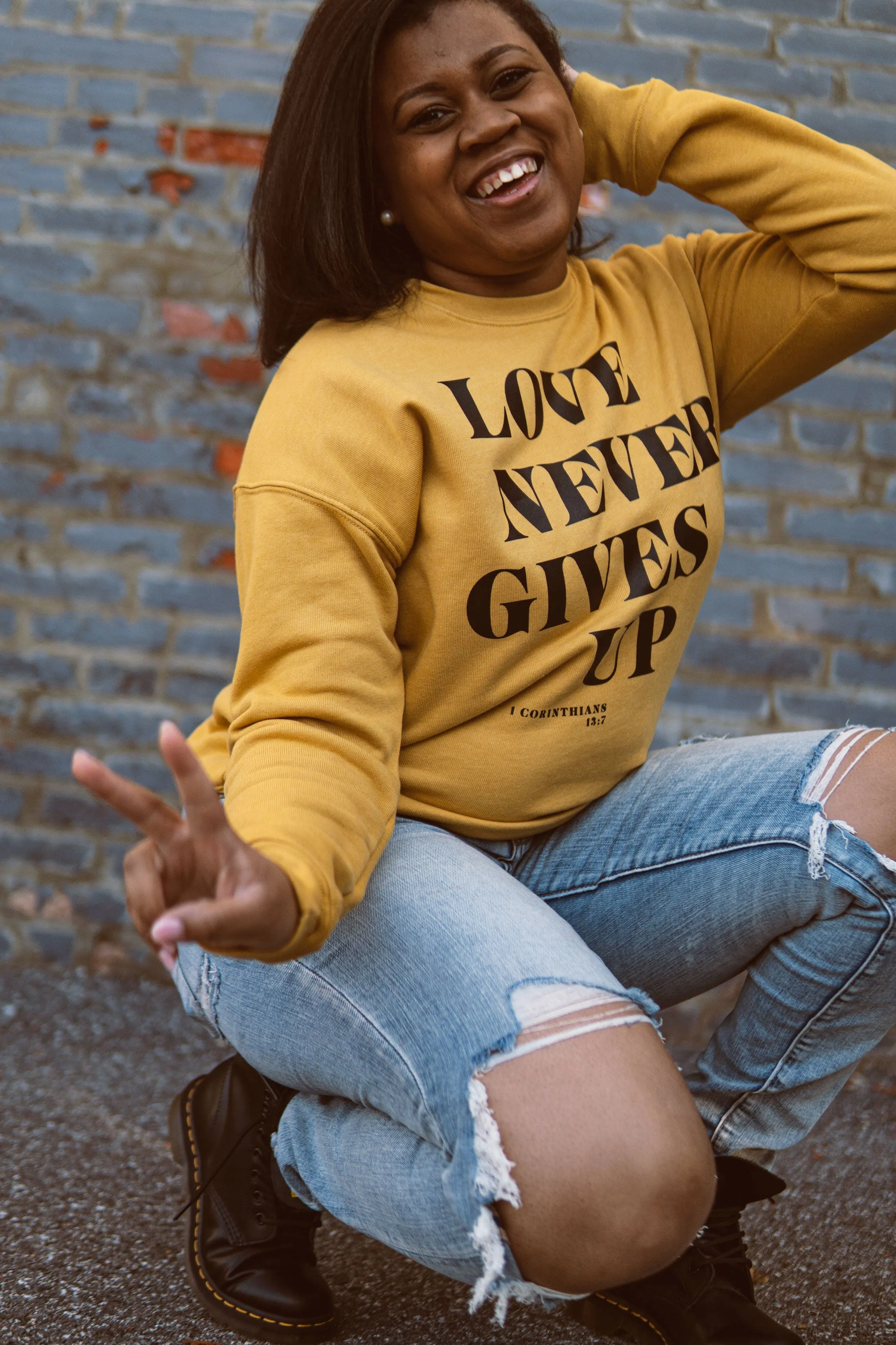 Love Never Gives Up This Adult Drop Shoulder Sweatshirt