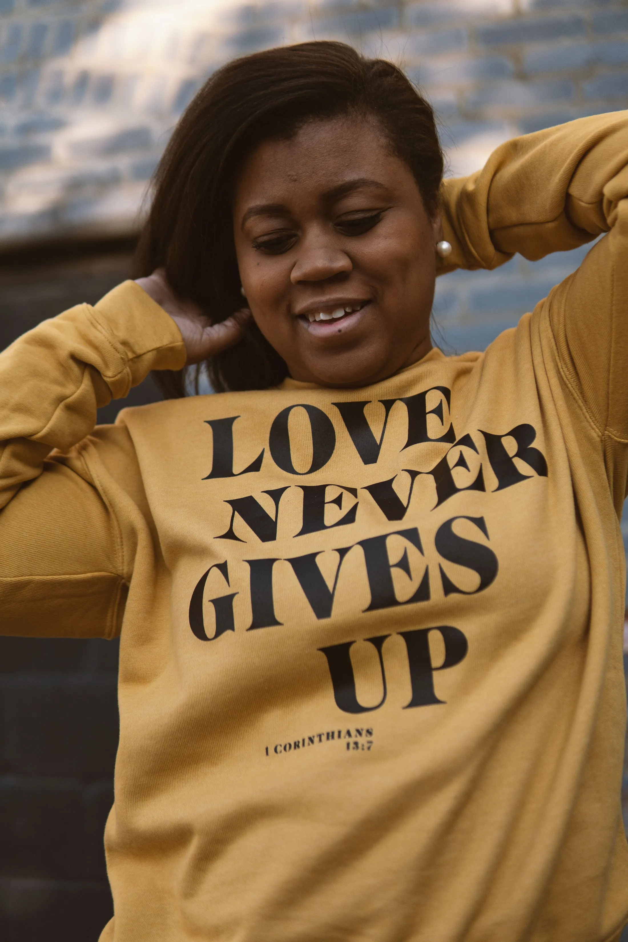 Love Never Gives Up This Adult Drop Shoulder Sweatshirt