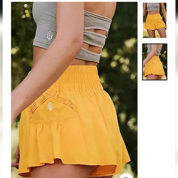 NWOT FP MOVEMENT BY FREE PEOPLE GET YOUR FLIRT ON SHORTS IN SOLAR POWER SZ LARGE
