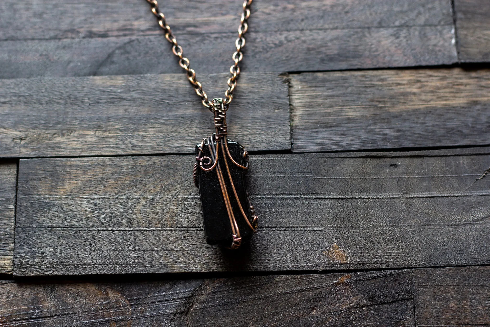 Purple and Black Glass Pendant with Copper Wire Wrapping
