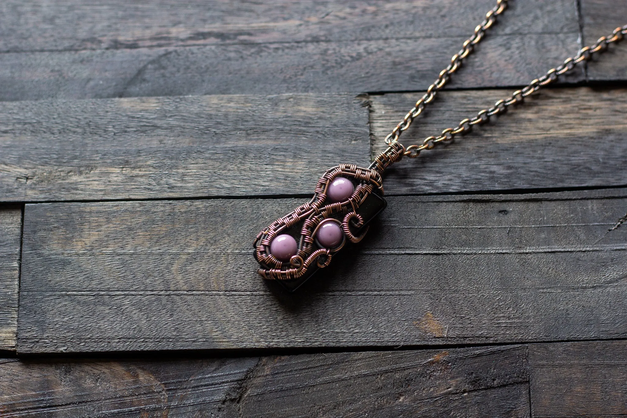 Purple and Black Glass Pendant with Copper Wire Wrapping
