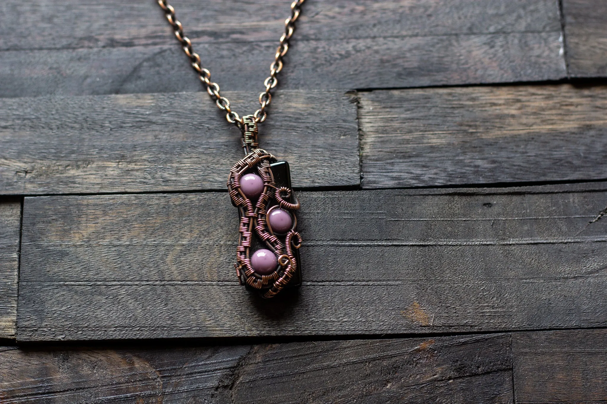Purple and Black Glass Pendant with Copper Wire Wrapping